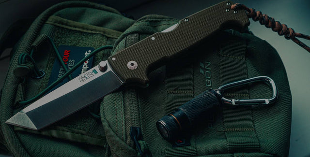 knives-and-weapons-in-bug-out-bag-darkened